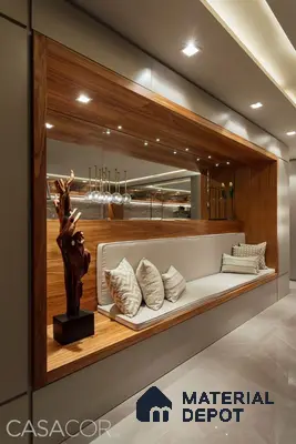 A bathroom with a large tub in the middle of the room and two windows overlooking the city at night time area, next to a window filled with lots of the city at night time Space in the background